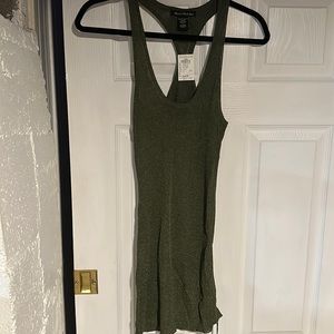 Brand new/never worn sexy shimmery green long tank